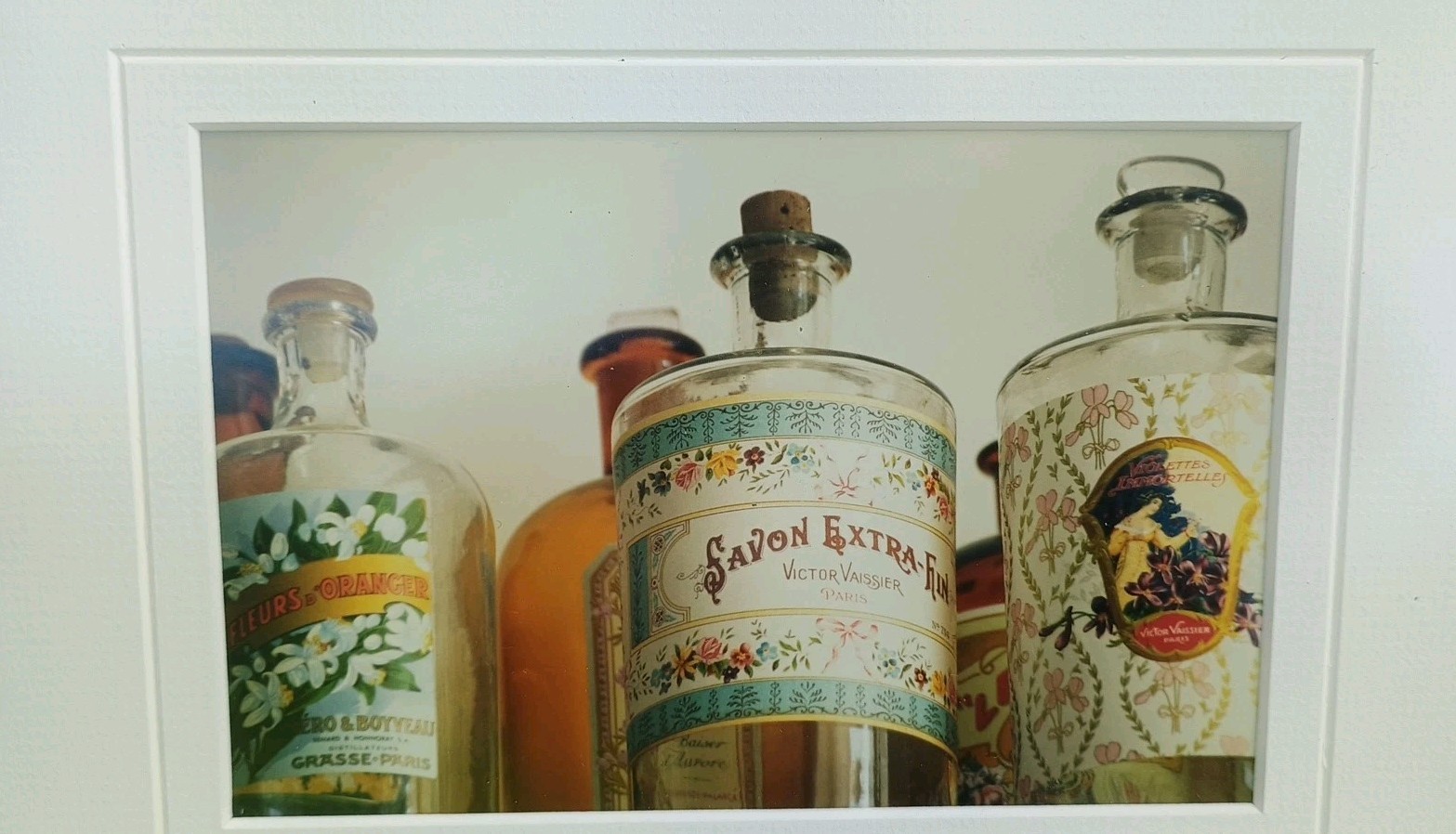 MADELINE GRAY Signed 2 Photographs Perfume bottles Matted Silver Framed 13×10.5″