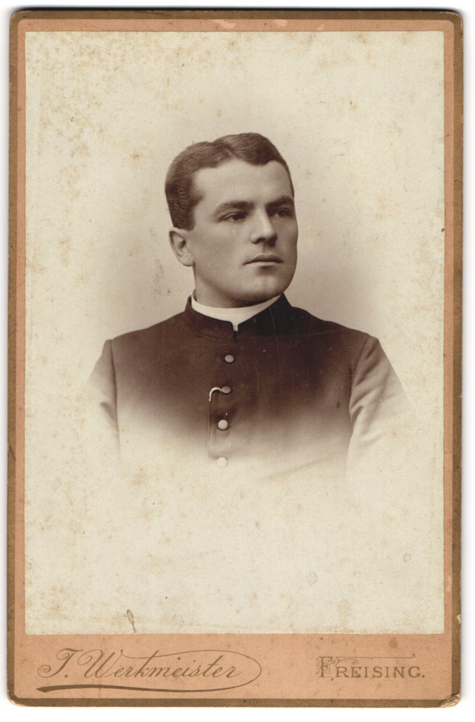 Photograph J. Werkmeister, Freising, young pastor in gown with collar