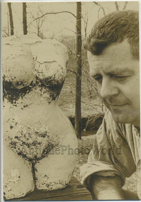 Man by female figure sculpture vintage art photo