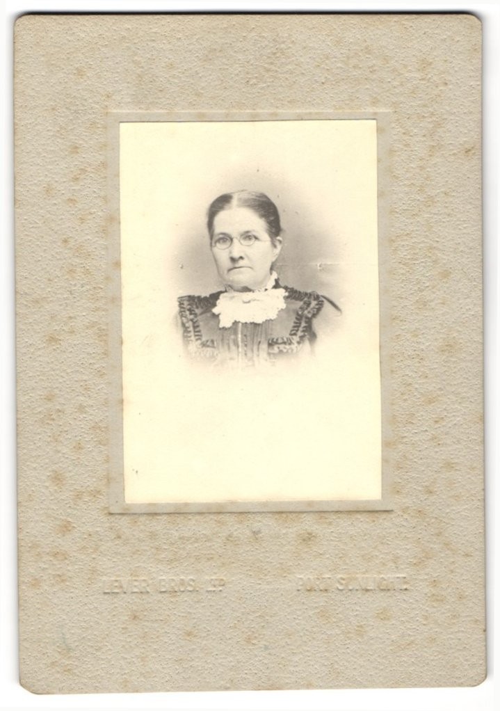 Photograph Lever Bros., Port Sunlight, Lady in Dress with Glasses