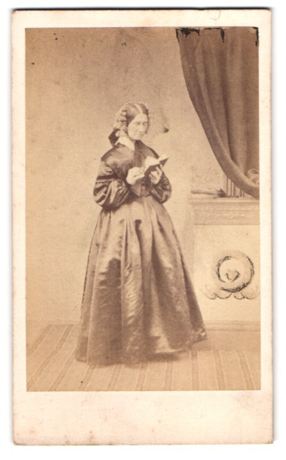 Photograph Elderly Lady in Dark Dress Reading a Book in Studio