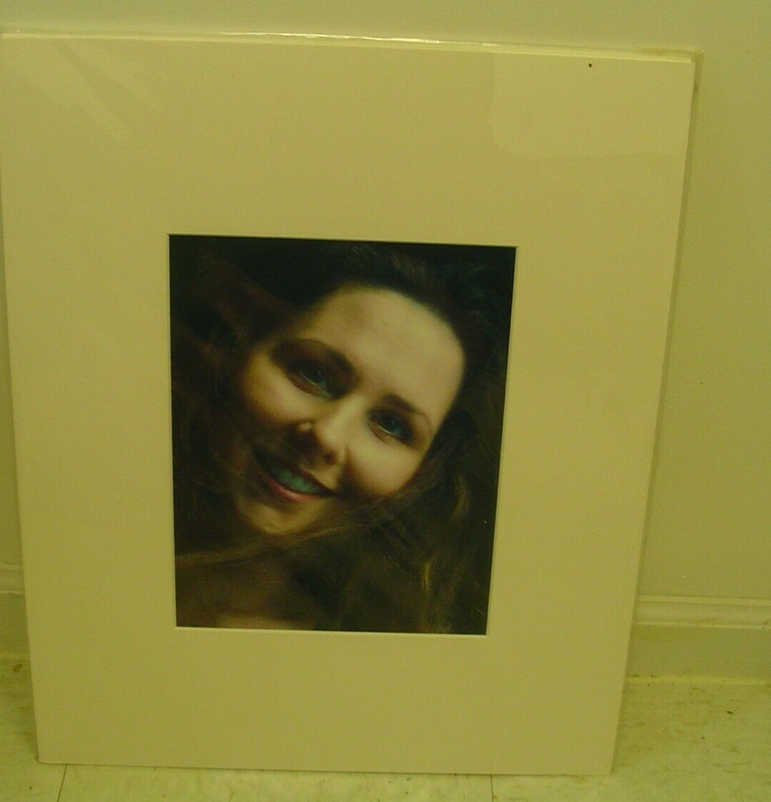 MATTED PHOTOGRAPHY Woman zoomed up smiling by Larry Santucci 16×20