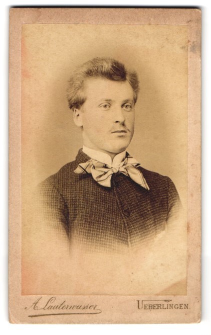 Photograph A. Lauterwasser, Ueberlingen, portrait of a young man with fly