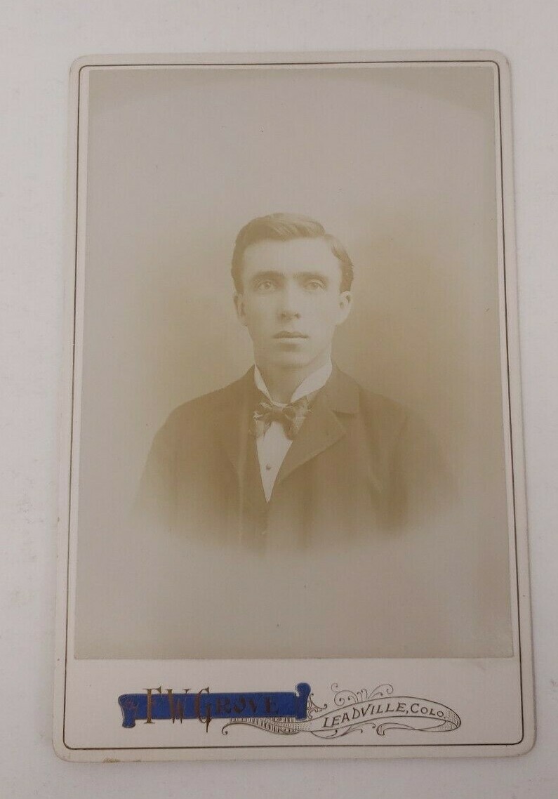 Antique Cabinet Card Photograph- Nicely dressed man in a suit taking a headshot