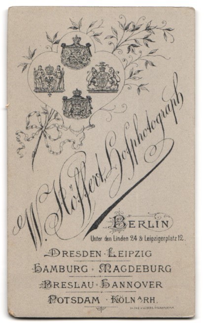 Photograph W. Höffert, Berlin, Unter den Linden 24, man in suit and with Schnu