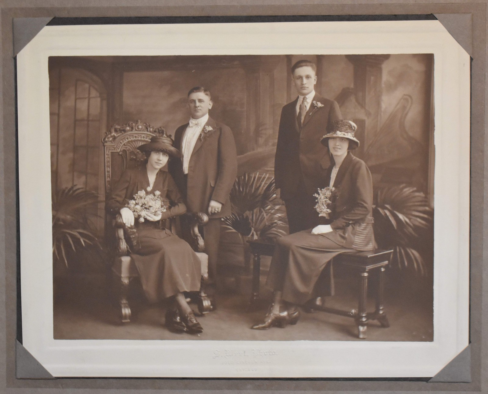 Antique Photograph of Four People In a Conservatory or Greenhouse