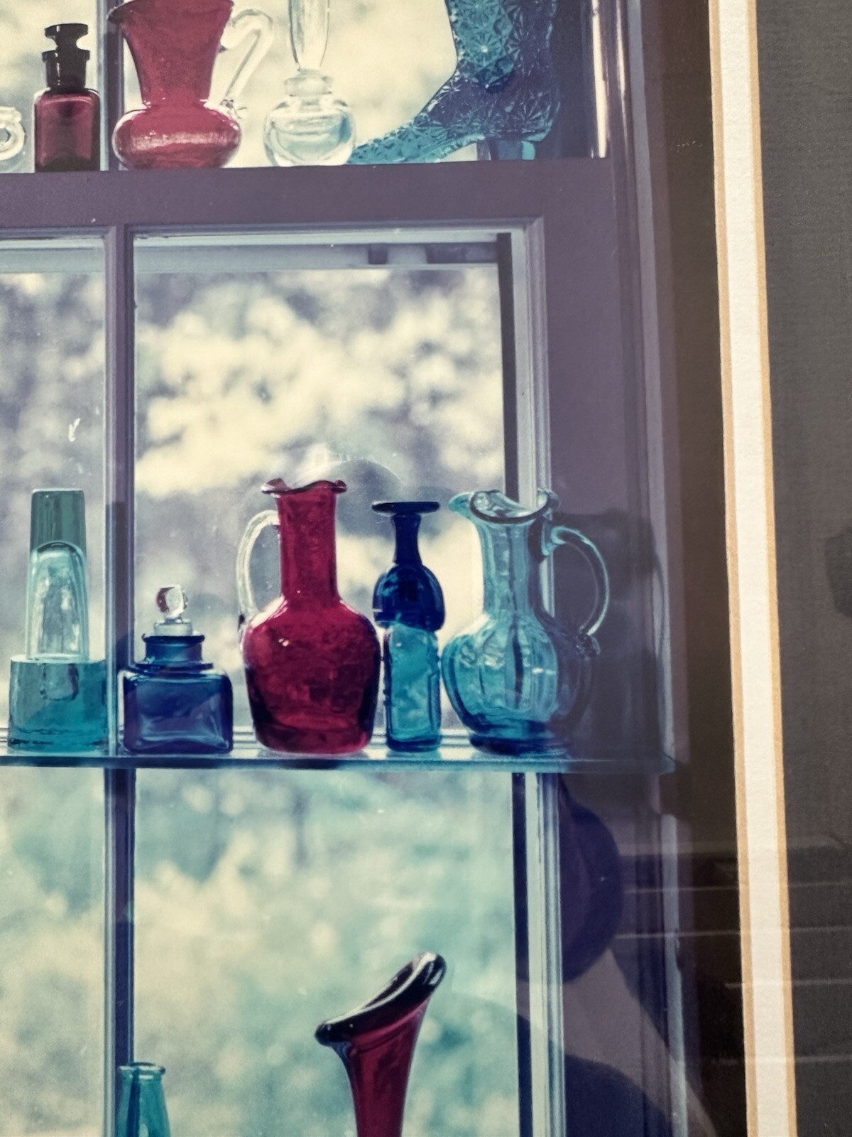 “Sunlit Memories in Colored Glass Bottles” Framed Photograph 21.5” X 25.5”