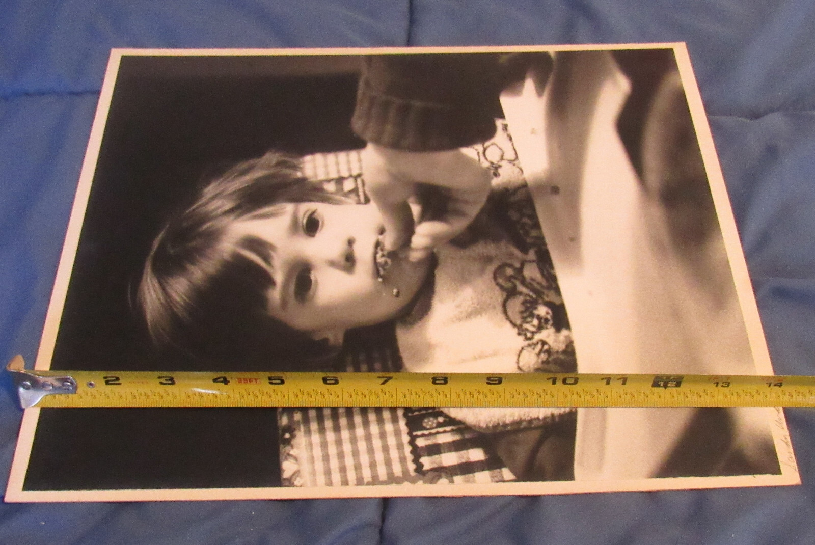 1977 Sandy Underwood photograph; child eating in high chair #2, 11″ x 14″
