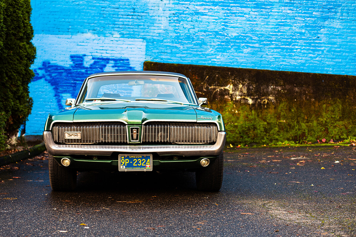 Mercury Cougar in Parking Lot with Brick Background 18” x 12”