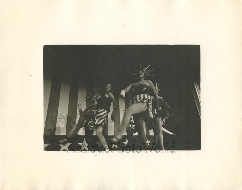 Women dancing in Statue of Liberty costumes US flag vintage art photo