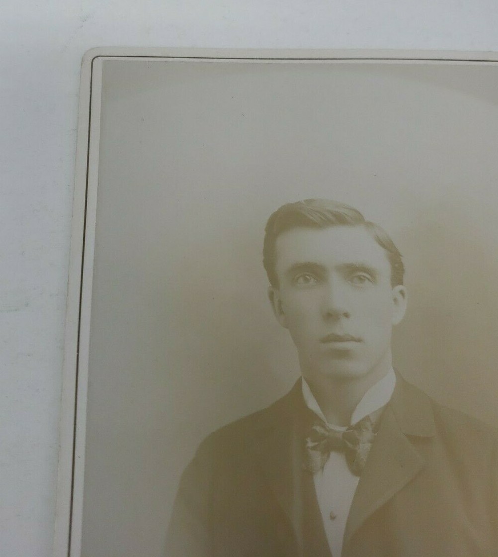 Antique Cabinet Card Photograph- Nicely dressed man in a suit taking a headshot