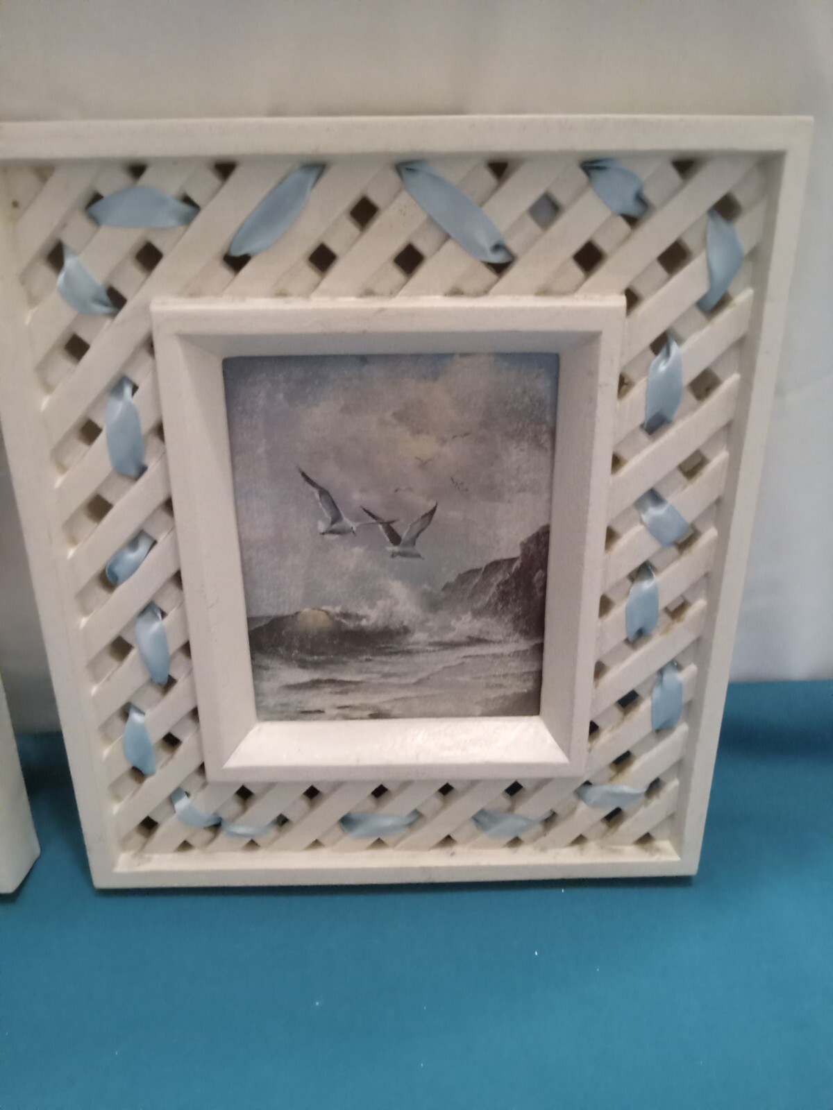 two sea gull pictures, measuring 9″ tall x 8″ wide. used in fair cond.