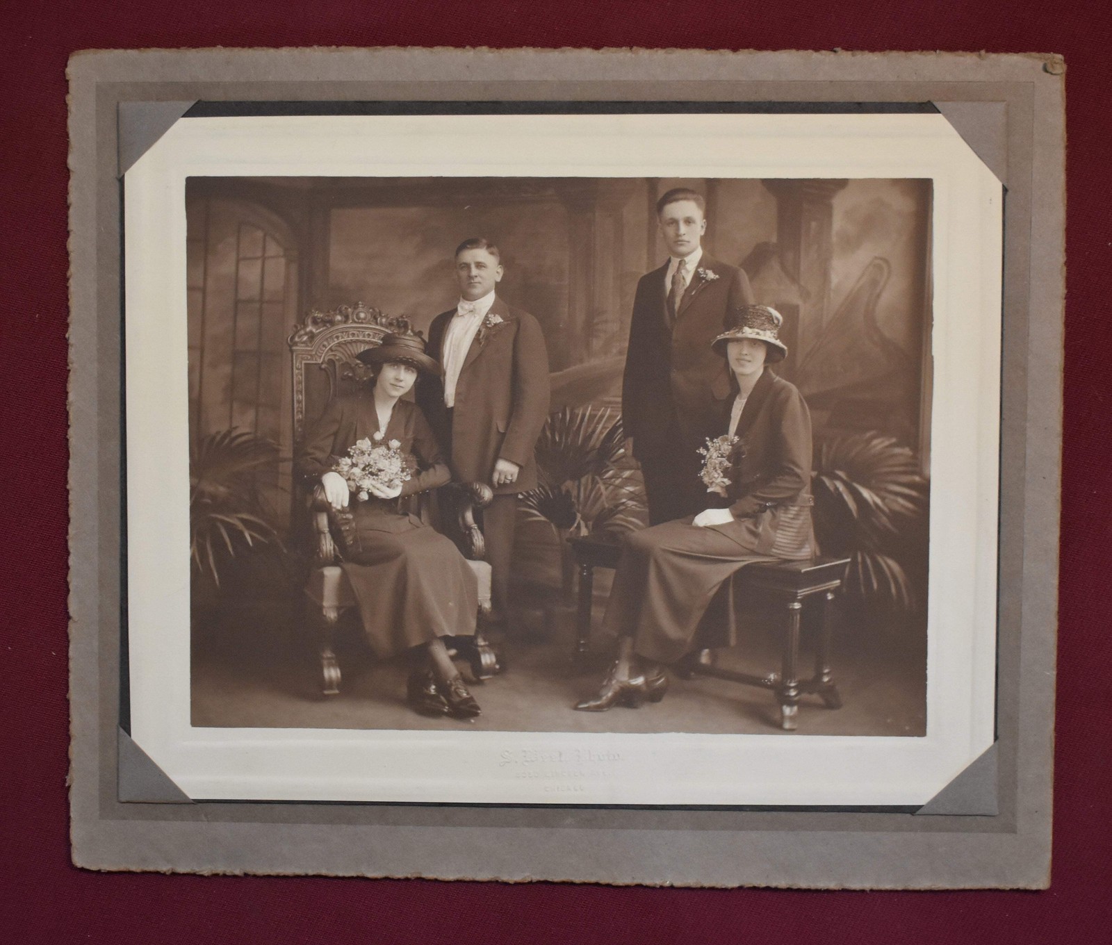 Antique Photograph of Four People In a Conservatory or Greenhouse