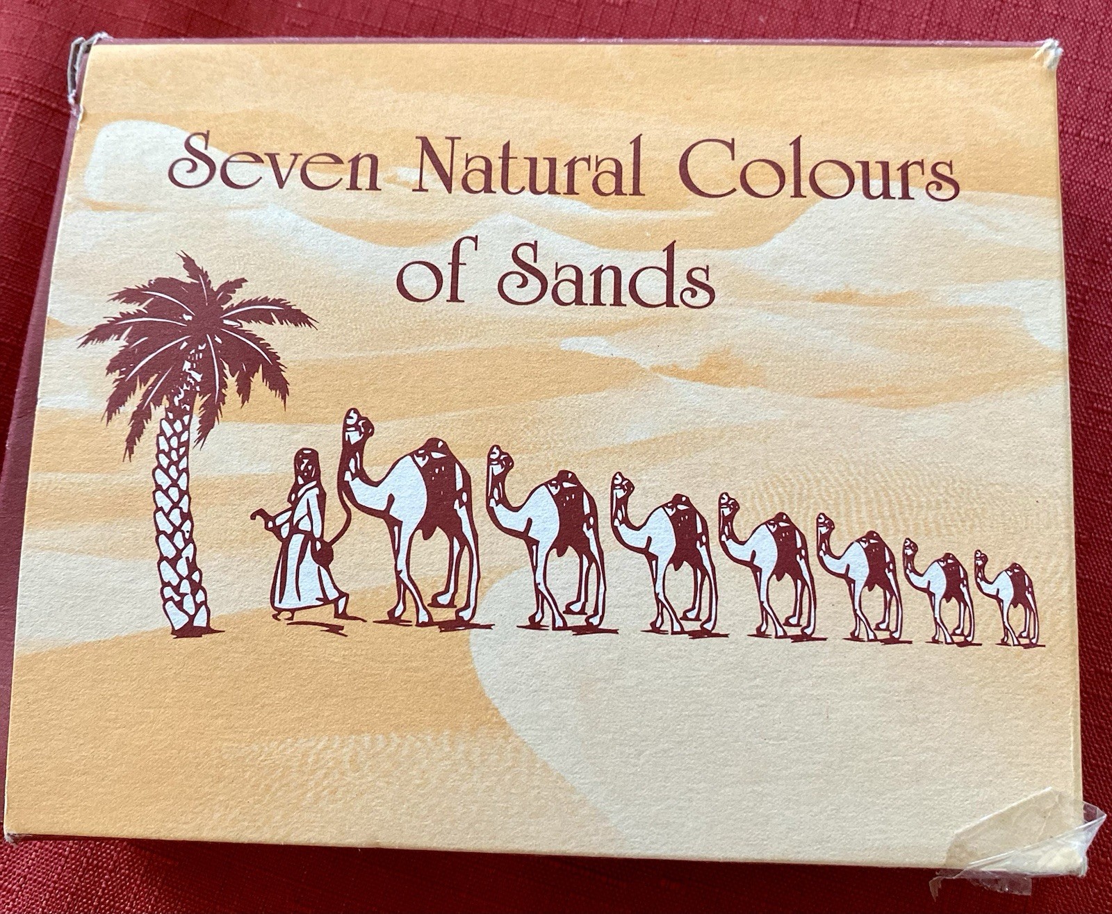 A combination of silver-tone miniatures and “Seven Sands” art.