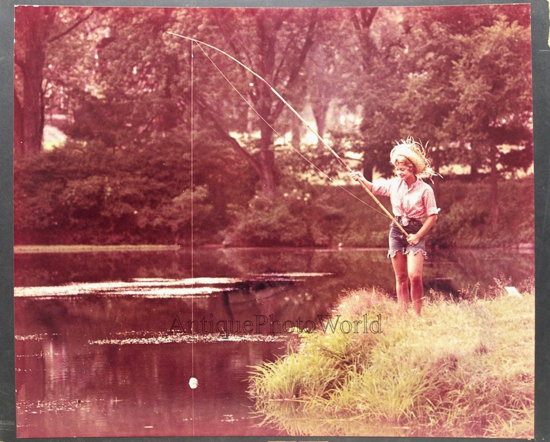 Sexy woman fishing in lake vintage art photo by Samuel Needleman