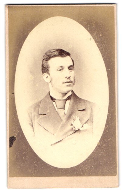 Photograph Portrait of a Young Man with Flower in Lapel