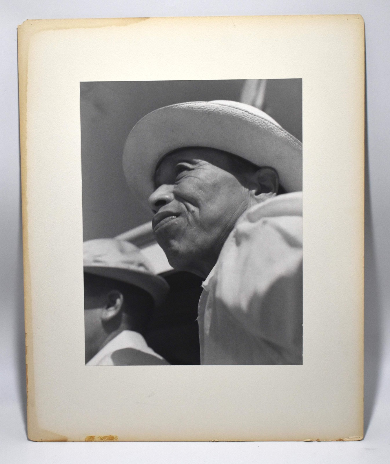 Vintage J.W. Howlett Black + White Photograph Focusing on A Man Wearing a Hat