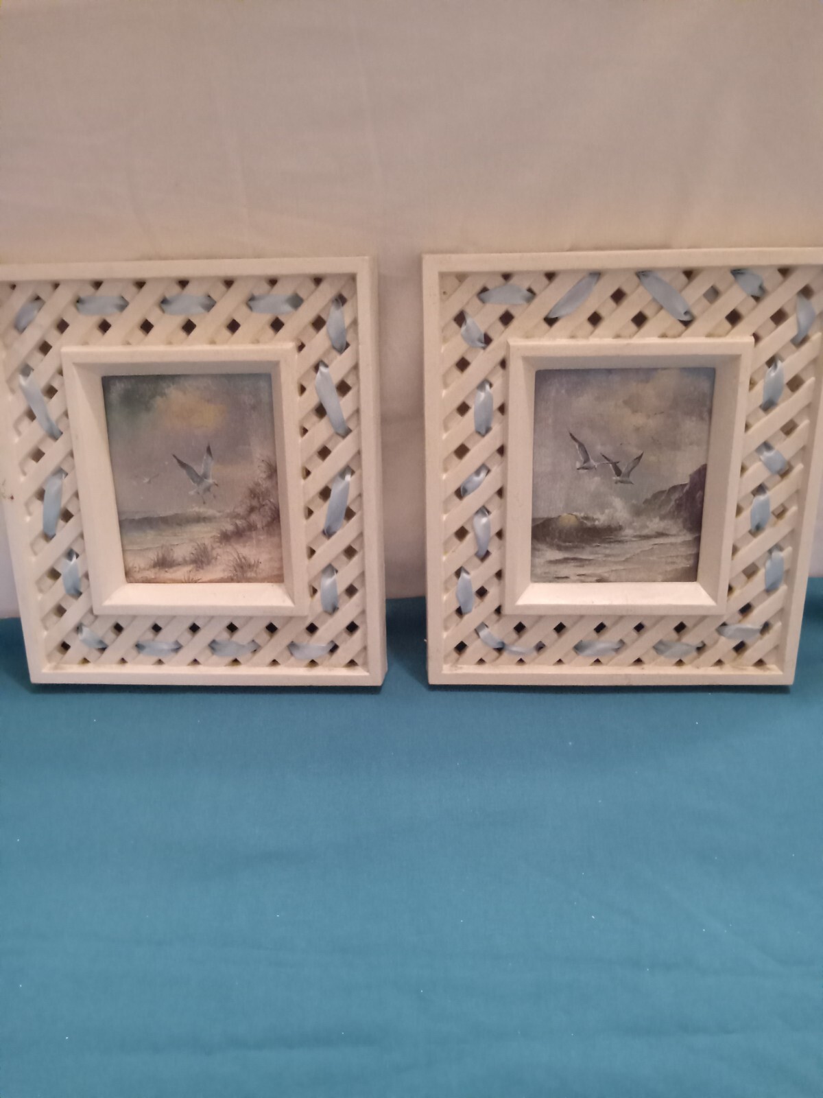 two sea gull pictures, measuring 9″ tall x 8″ wide. used in fair cond.