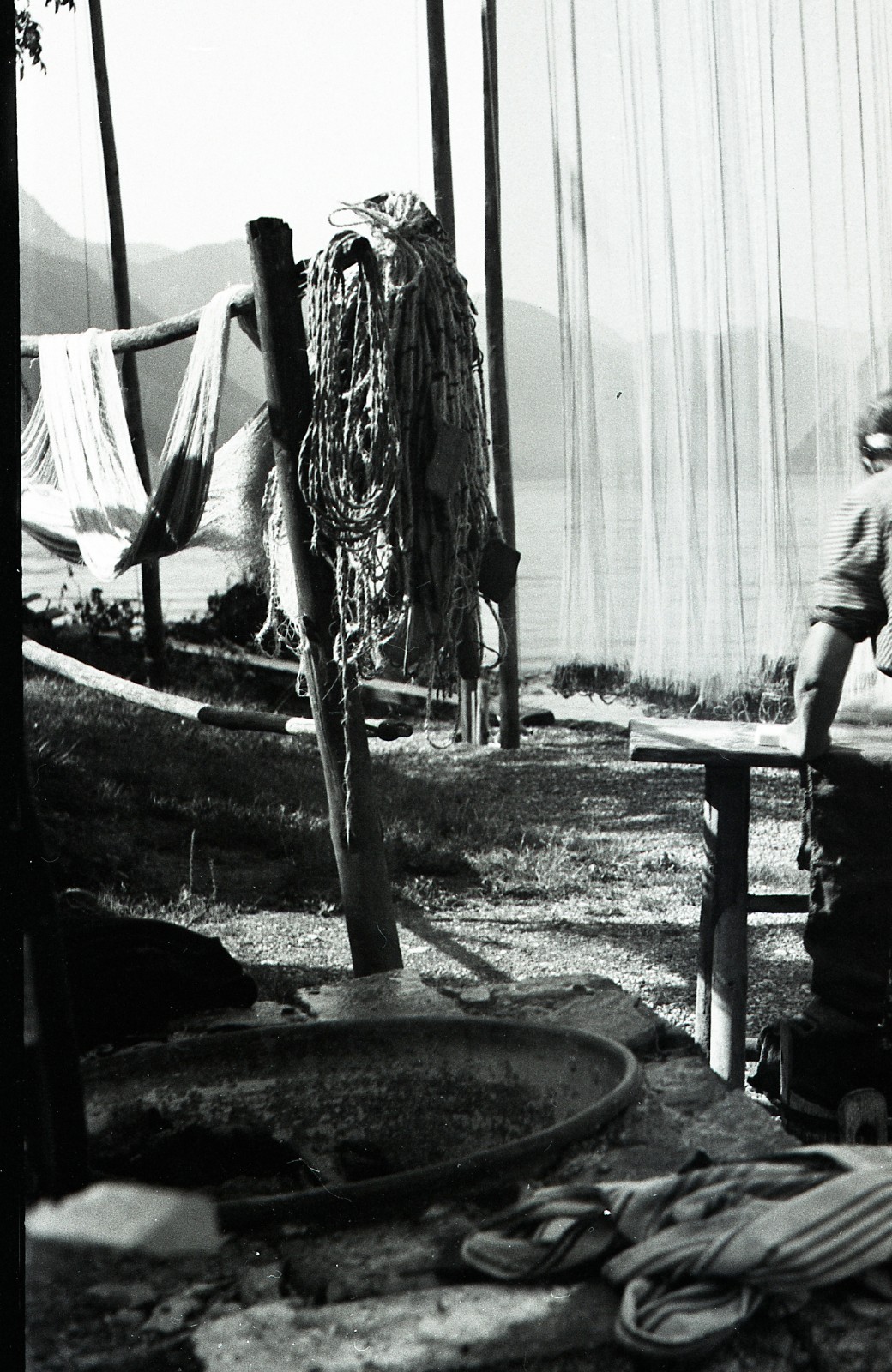 Salzkammergut , Austria, village, woman w traditional fishing net, by Eduard PEZ