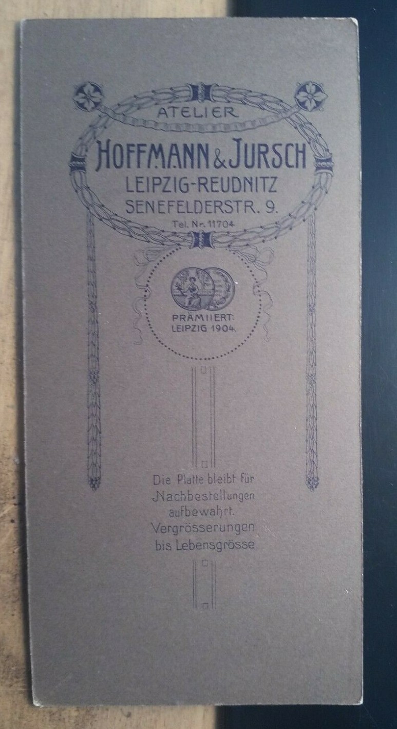 standing young man with book in hand/KAB Hoffmann & Jursch Leipzig Reudnitz