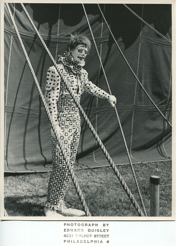 Sad clown posing by circus tent vintage art photo by Edward Quigley