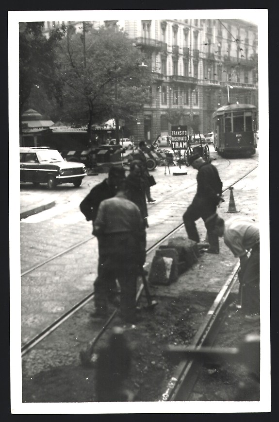 Photograph Milan, tram with track builders renewing the base plates,
